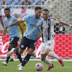 Rajan Šerki i Filip Kostić (Foto: Beta/AP Photo/John Raoux)